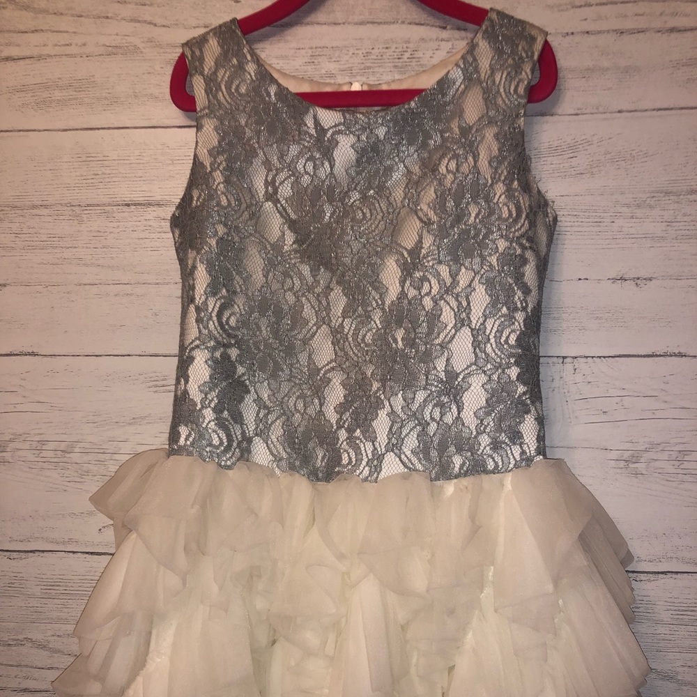 Dollie girl lace dress with frilly tulle skirting.